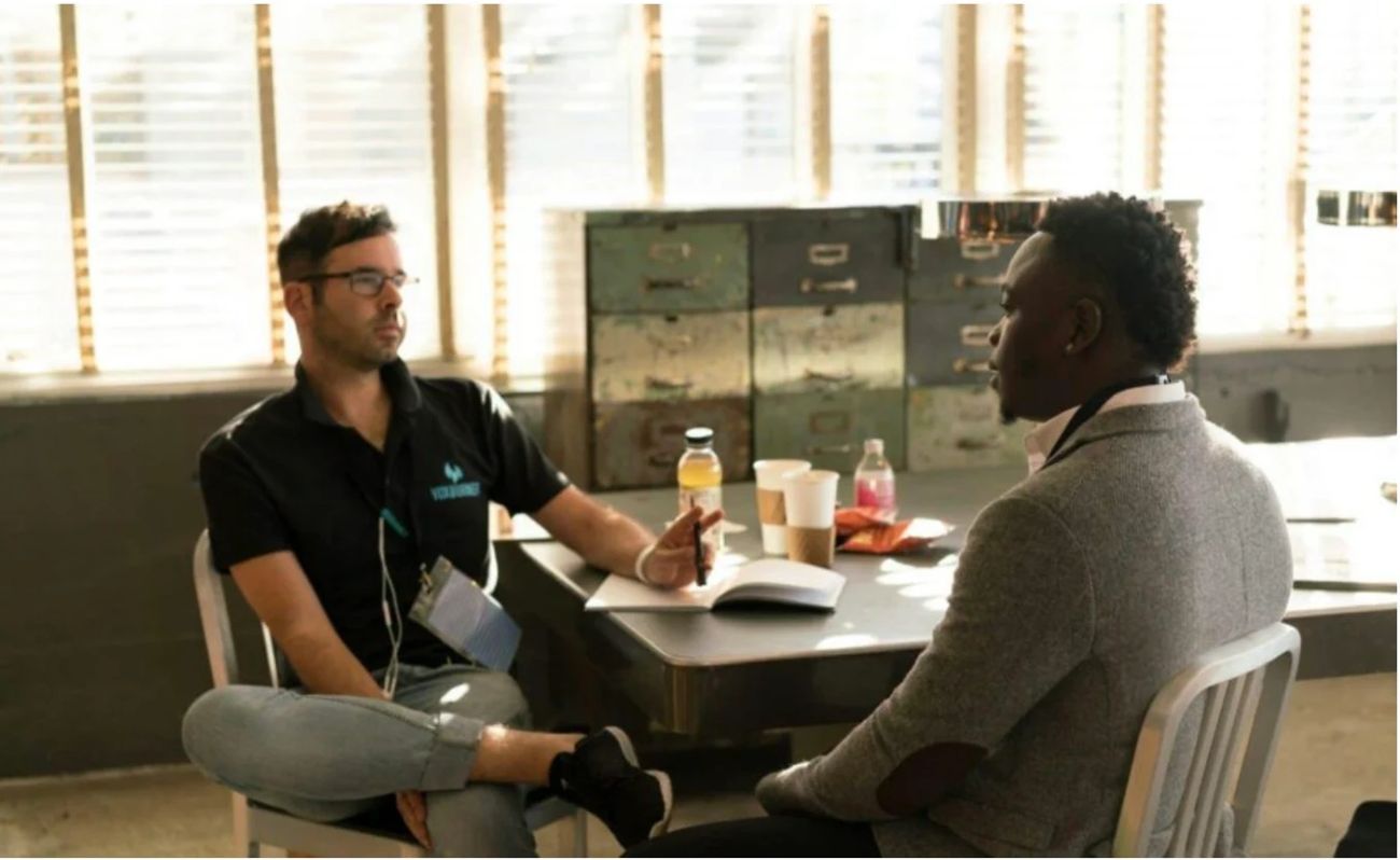 CloudCore technician consulting with a local business owner