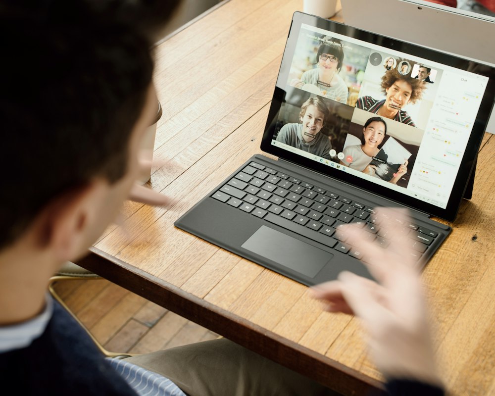 Video call on a laptop for residential tech support